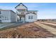 New home with modern farmhouse architecture and professional landscaping at 8950 Whiteclover St, Littleton, CO 80125