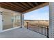 Covered patio offers outdoor living space with neighborhood views at 8950 Whiteclover St, Littleton, CO 80125