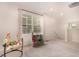 Upstairs bonus room featuring carpet and a large window for ample natural light at 16432 Snowbourn Dr, Parker, CO 80134