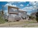 Spacious backyard boasts a stone patio, providing an inviting space for gatherings and enjoying the outdoors at 22921 E Euclid Cir, Aurora, CO 80016