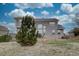 Well-maintained backyard with stone patio, ideal for outdoor dining and relaxation amidst green surroundings at 22921 E Euclid Cir, Aurora, CO 80016