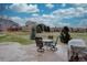 Large backyard patio with outdoor seating and mountain views at 22921 E Euclid Cir, Aurora, CO 80016