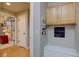 Inviting entryway featuring coat storage, hardwood floors, and stylish accents at 22921 E Euclid Cir, Aurora, CO 80016