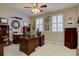 Office with two large windows, a ceiling fan, and decor at 22921 E Euclid Cir, Aurora, CO 80016