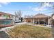 Spacious backyard with camper, patio, and lawn at 2665 S Pennsylvania St, Denver, CO 80210