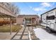 View of the backyard with camper, patio, and hot tub at 2665 S Pennsylvania St, Denver, CO 80210