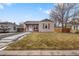 Charming single-story home with a well-maintained front yard and a cozy, inviting exterior at 2665 S Pennsylvania St, Denver, CO 80210