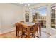 Eat-in breakfast nook with modern lighting and a sliding glass door at 3000 E 112 Ave # 102, Northglenn, CO 80233