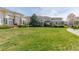 Well-maintained community green space and walkway between multi-Gathering residences at 3000 E 112 Ave # 102, Northglenn, CO 80233