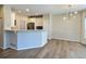 Modern kitchen with stainless steel appliances and breakfast bar, ideal for meal prep and casual dining at 3000 E 112 Ave # 102, Northglenn, CO 80233
