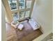 Bright living room boasts lots of natural light with large windows and comfortable seating arrangement at 3000 E 112 Ave # 102, Northglenn, CO 80233