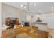 Open floor plan with a breakfast nook, living room and a fireplace at 3000 E 112 Ave # 102, Northglenn, CO 80233