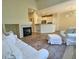 Open concept living space with fireplace, perfect for entertaining and comfortable living at 3000 E 112 Ave # 102, Northglenn, CO 80233