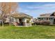 Shaded pavilion in a community green space featuring seating at 3000 E 112 Ave # 102, Northglenn, CO 80233