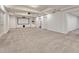 Finished basement with a large media area at 9562 Silent Hills Ln, Lone Tree, CO 80124