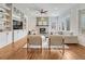 Open living room with fireplace and hardwood floors at 9562 Silent Hills Ln, Lone Tree, CO 80124