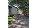 Backyard area featuring gravel landscaping with mature trees and side yard at 2998 S Adams St, Denver, CO 80210
