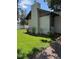 Well-maintained home exterior showcasing manicured lawn and landscaping at 2998 S Adams St, Denver, CO 80210