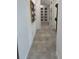 Clean hallway features stylish tile flooring, crisp white walls, and sleek doors at 2998 S Adams St, Denver, CO 80210