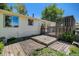 Home's backyard with wooden deck and siding at 16215 E Brunswick Dr, Aurora, CO 80013