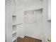 Walk in closet with carpet flooring and wire shelving units at 16215 E Brunswick Dr, Aurora, CO 80013