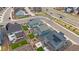 Aerial view featuring solar panels on roof, manicured lawn and backyard landscaping at 8268 Mt Harvard Rd, Littleton, CO 80125