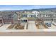 Beautiful two-story home with stone accents, landscaped front yard, and attached two-car garage at 8268 Mt Harvard Rd, Littleton, CO 80125