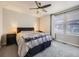 Comfortable bedroom with a ceiling fan, natural light, and neutral color scheme at 3744 Celestial Ave, Castle Rock, CO 80109