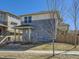 Charming home exterior featuring a covered front porch, modern siding, and a well-maintained lawn at 3744 Celestial Ave, Castle Rock, CO 80109