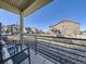 View from a cozy front porch, showcasing the neighborhood street and surrounding homes at 3744 Celestial Ave, Castle Rock, CO 80109