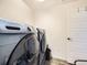 Functional laundry room featuring modern appliances and a convenient layout at 3744 Celestial Ave, Castle Rock, CO 80109