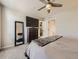 Spacious main bedroom showcasing a large dresser with a TV and an adjacent walk-in closet at 3744 Celestial Ave, Castle Rock, CO 80109