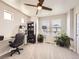 Functional home office with ample natural light and a modern standing desk at 3744 Celestial Ave, Castle Rock, CO 80109