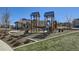Vibrant playground with slides, climbing structures, and a gazebo for community enjoyment at 3744 Celestial Ave, Castle Rock, CO 80109