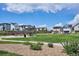 Landscaped community park with a gazebo, benches, and green lawn at 10557 Eby Cir, Lone Tree, CO 80124
