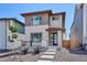 Modern two-story house with mixed siding and a manicured front yard at 10557 Eby Cir, Lone Tree, CO 80124