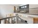 Open-concept living area with hardwood floors, modern furniture, and natural light from the windows at 10557 Eby Cir, Lone Tree, CO 80124