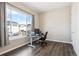 Bright office space with a large window offering neighborhood views at 10557 Eby Cir, Lone Tree, CO 80124