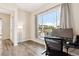 Bright office space with a large window offering neighborhood views at 10557 Eby Cir, Lone Tree, CO 80124