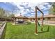 Serene backyard oasis featuring an open gazebo, manicured lawn, and inviting hammock for relaxation and outdoor enjoyment at 11896 W 107Th Ave, Westminster, CO 80021