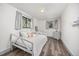 This bedroom offers lots of light from the two windows and a calming color scheme at 11896 W 107Th Ave, Westminster, CO 80021