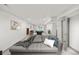 Spacious living room with pool table, comfortable gray sofa and neutral decor at 11896 W 107Th Ave, Westminster, CO 80021