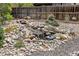Backyard water feature featuring rocks and plants at 11896 W 107Th Ave, Westminster, CO 80021