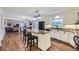 Open kitchen featuring a center island and updated appliances at 5988 E Jamison Ln, Centennial, CO 80112