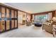 Spacious living room with large windows and comfortable seating at 5988 E Jamison Ln, Centennial, CO 80112