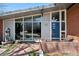 Close-up of the home's front entrance, highlighting the modern door and architectural details at 3895 Chimayo Rd, Littleton, CO 80123