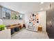 Bright playroom with fun decor, windows, and modern furnishings at 3895 Chimayo Rd, Littleton, CO 80123