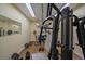 Basement gym with multiple weights and machines at 8165 Tempest Ridge Way, Parker, CO 80134