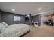Finished basement bedroom with a work station at 8165 Tempest Ridge Way, Parker, CO 80134