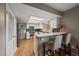 Bright kitchen with modern appliances, breakfast bar, and pantry access at 8165 Tempest Ridge Way, Parker, CO 80134